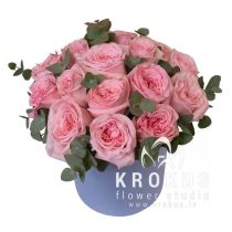 Pink peony roses in a box